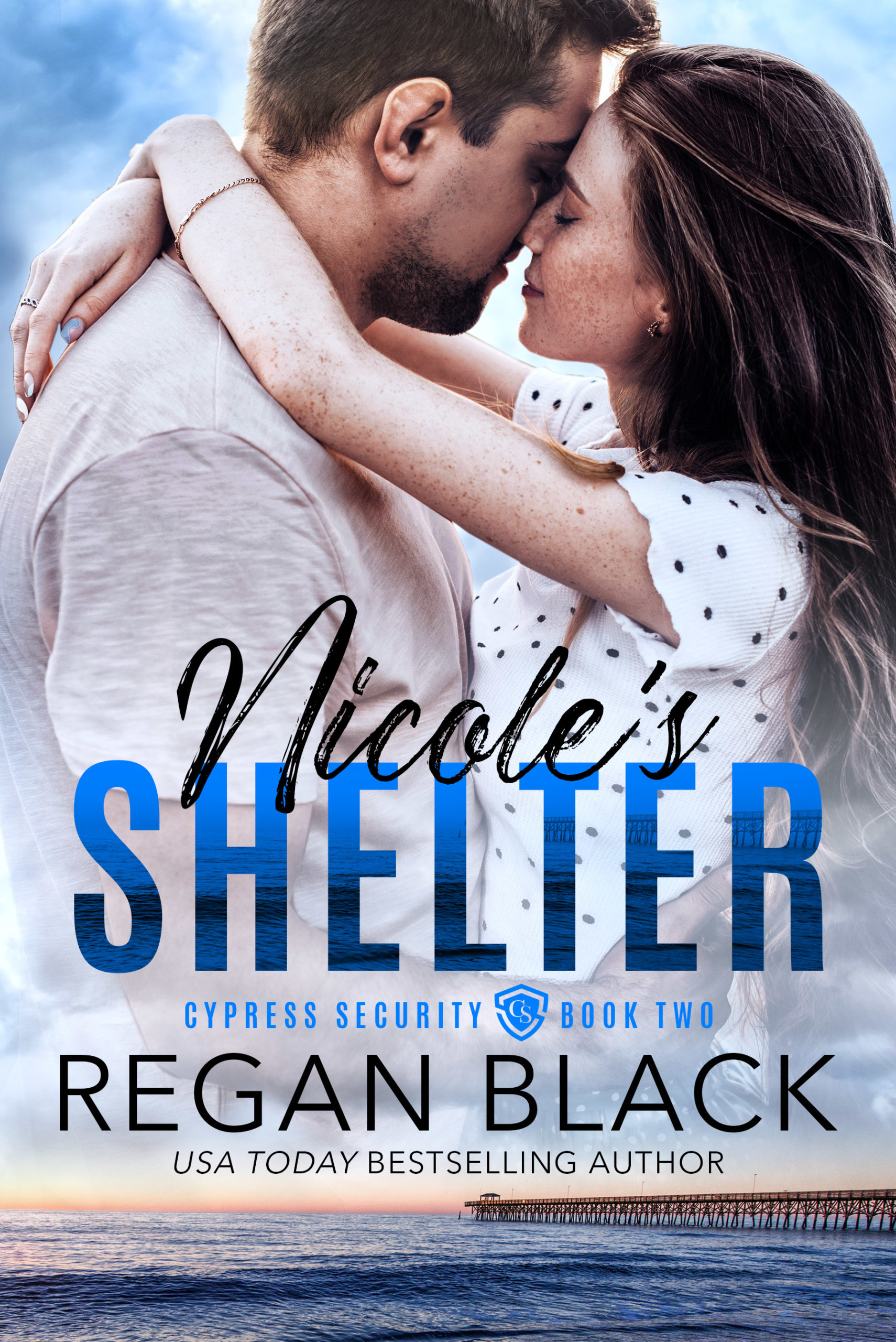 A book cover for "Nicole's Shelter" by Regan Black featuring a couple in a close embrace with an ocean pier in the background