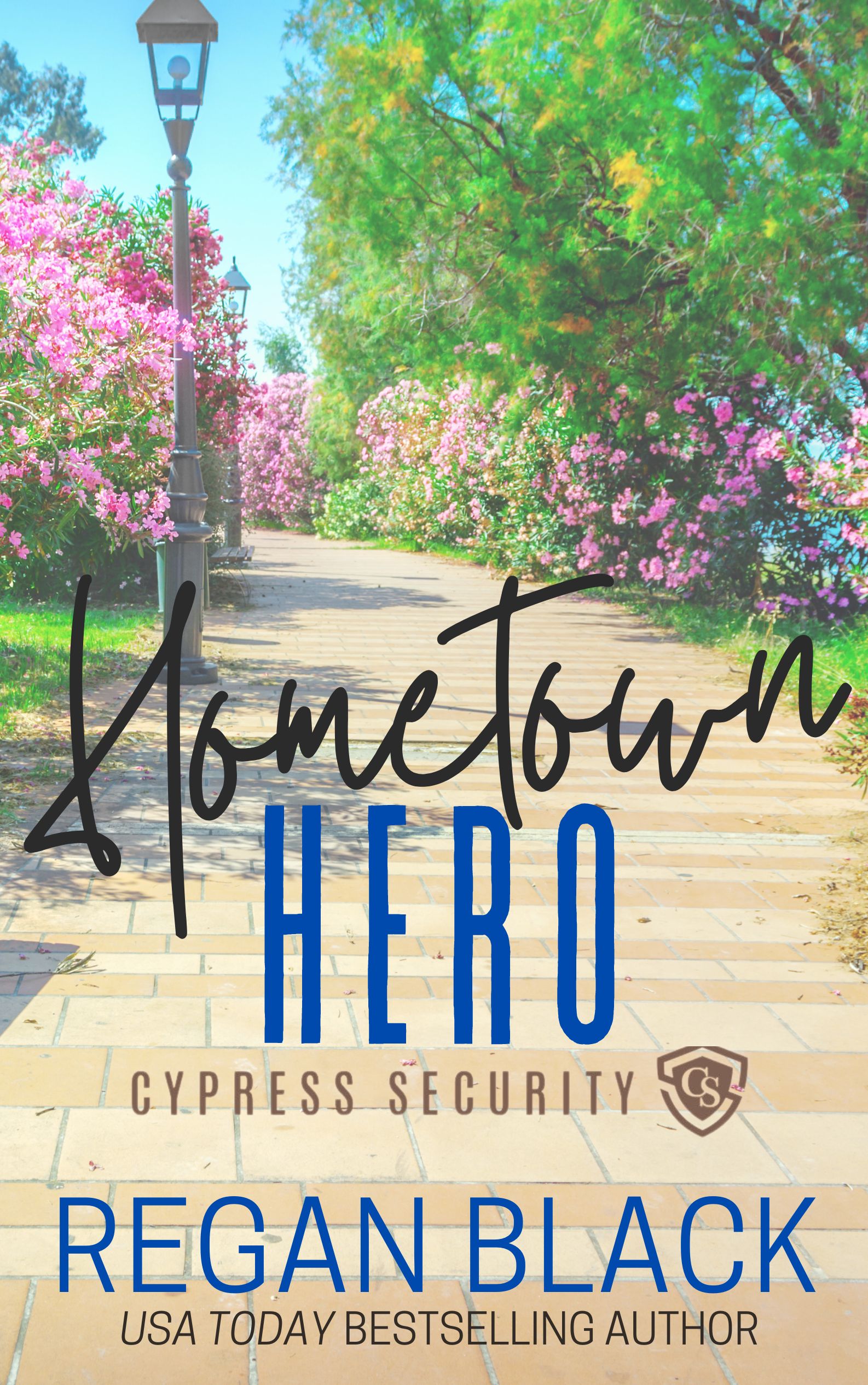 A book cover for "Hometown Hero" by Regan Black featuring a paved path through a park full of flowers