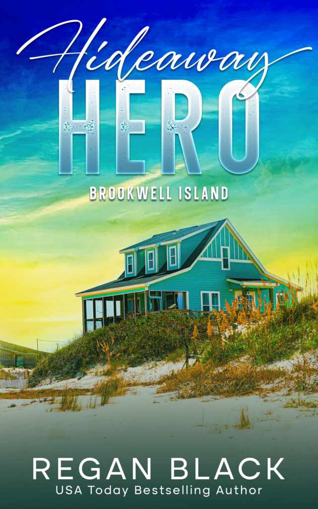 A book cover for Hideaway Hero by Regan Black featuring a big house on the beach under a sunny sky