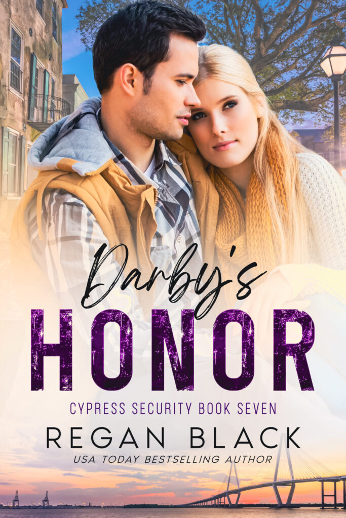 Book cover art for Darby's Honor by Regan Black, featuring a couple in a close embrace on a street